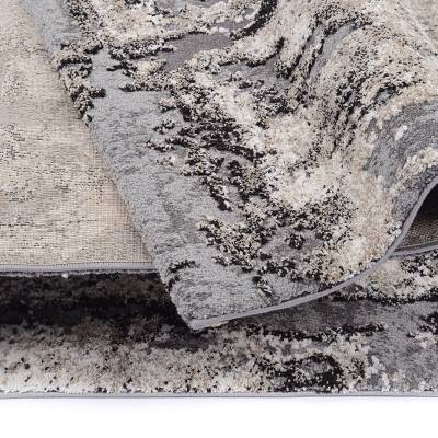 Detailaufnahme abstrakter Designteppich in creme und grau von heineking24